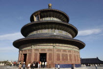 aka The Temple of Heaven. View of the Hall of Prayer for Good Harvests with people gathered at the base