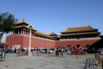 Exterior view of a section of the Meridian Gate with passing traffic