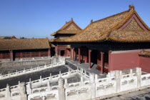 Small group of buildings in the complex on a raised level with steps leading up to them