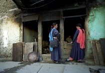 Ladies at the bakery waiting for fresh bread