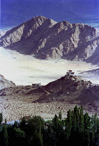 View toward distant Temples on the outskirts of the town against a backdrop of mountains