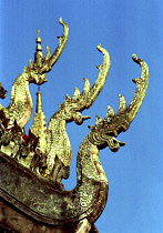 Wat Sainyamungkhun. Golden roof detail of Guardians in the form of dragons used to keep evil spirits away