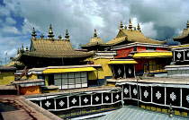 Section of The Potala Palace with colourful rooftops and hangings