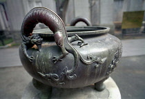 Ancient Emperors cooking pot with handles in the form of dragons