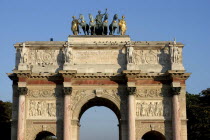 View of the Arc de Triomphe du Carrousel triumphal arch with equestrian statues atop