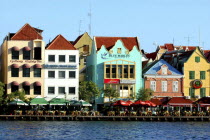 Old Willemstad. Row of brightly painted waterfront restaurants and cafes