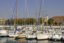 Harbour with rows of moored boats