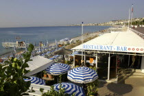 View over restaurant umbrellas to the beach