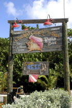 Cracked Conch by the Sea Patio Bar sign