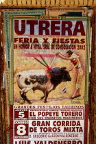 Bull fight poster showing a drawing of a matador spearing a bull