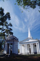 St. Georges Church.  Anglican church built in 1817 using convict labour.  Classical style exterior with free standing open sided turret in foreground.