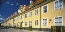 Swedish Gate. Row of bright yellow terraced houses