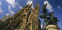 Angled view of the facade of La Sagrada Familia by Gaudi with no cranes visible