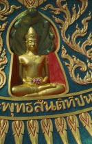 Small golden seated Buddha at the Big Buddha Temple on the north coast