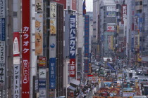 Okachimachi. View along advertising signs covering the architecture of a busy city street