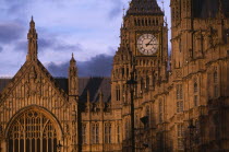 Westminster. Exterior section of the Houses of Parliament and Big Ben seen in evening light