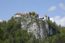 Bled Castle perched on high cliffs above the Lake