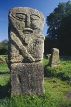 One of two double faced pre christian figures that stand in Caldragh cemetary