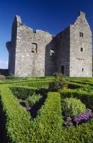 Tully Castle. Ruins of a fortified plantation house dating from 1610 with recently planted early 17th century style formal garden