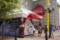 World of Coca Cola pavilion exterior with crowds of visitors.American Georgian Kids Middle East North America Sakartvelo United States of America Western Asia Asian Pavillion