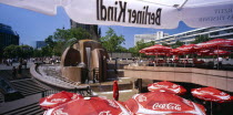 Breitscheidplatz. View over red Coca Cola umbrellas toward the World Fountain