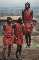 Maasai Moran measure each others capacity to jump springing from a standing start. They often sing in a group as they do this each taking turns to jump.