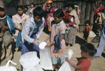 Guatemalan refugees being given food aid