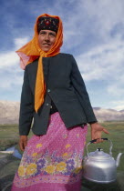 Kazakh lady holding a kettleTashgurgen  Tashgurgen