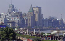 View over The Bund waterside area towards city skyline