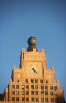 The Paramount Building  detail of stepped roof and clock face. Built in 1926  once housed the Paramount Theater.