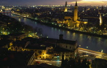 View over the Adige river and city at night.European Italia Italian Nite Southern Europe