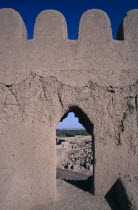 Arg e Bam Citadel crenellations and view of the old city beyond