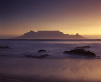 View of Table Mountain at dawn taken from Bloubergstrand shore line