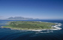 Aerial view of the prison island with table Mountain in the distance