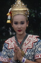 Erewan Shrine Temple Dancer giving a traditional Thai Wai greeting