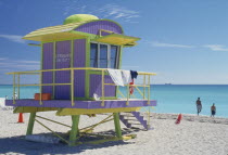 Yellow green and lilac lifeguard hut on Miami beach