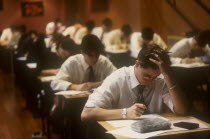 Male teen students taking Advanced level exams