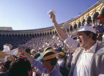 Arenal District  white handkerchiefs being waved by the crowd in the stands in the bullring