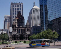 Copley Square and Trinity Church with a blue tram in the foreground