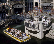 River Walk at the River Centre and pleasure boat on the Paseo del Rio