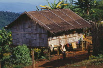 Red Lahu hilltribe village bamboo house with thatched roof