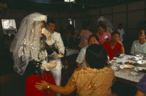 Jinghpaw wedding reception with Bridal couple and guests at the YMCA hallBurma Myanmar