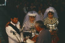 Jinghpaw wedding service with Bride and Groom at the Geis memorial churchBurma Myanmar