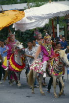 Crystal Children. Hill tribe boys ordination parade. Shan novice candidates riding ponies