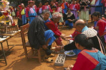 New Year. People paying respects to their elders by putting new socks on their feet