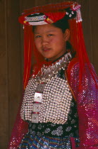 Young Lisu woman in her New Year finery prior to going to a New Year dance