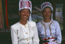 Portrait of two Rawang women at Manou ceremony