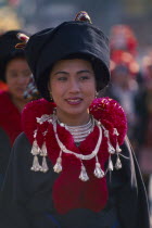 Portrait of a young Iu Mien woman in traditional Iu Mien attire