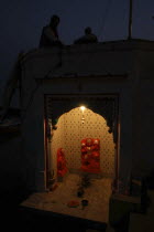 Near Hanuman Ghat. A Hanuman Shrine on the Ganges River at night