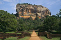 View along path toward huge monolithic rock site of fifth century citadel. Also called Lion Rock.